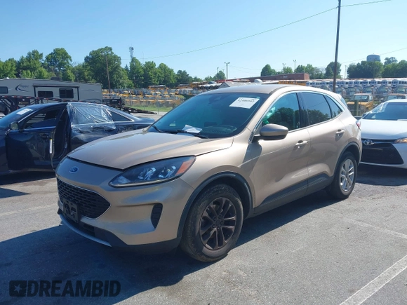 2021 Ford Escape SE with VIN 1FMCU0G67MUA00194, listed as a IAAI auction lot 42406942 with 62,553 mi miles and . Bid and sale history available at DreamBid. Image 2.