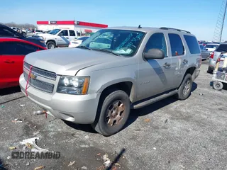 2007 Chevrolet Tahoe LTZ with VIN 1GNFC13JX7R149914, listed as a IAAI auction lot 41497405 with 264,932 mi miles and . Bid and sale history available at DreamBid. Image 2.