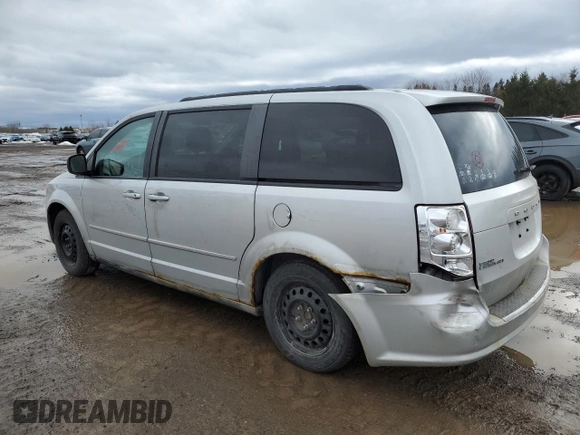 2011 Dodge Grand Caravan SXT with VIN 2D4RN4DG4BR686143, listed as a Copart auction lot 47405885 with 311,147 mi miles and Clean Title. Bid and sale history available at DreamBid. Image 2.