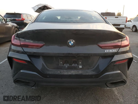 2023 BMW 8 Series 840i with VIN WBAGV2C01PCK95705, listed as a Copart auction lot 83424634 with 23,674 mi miles and Salvage Title. Bid and sale history available at carsss.com. Image 6.