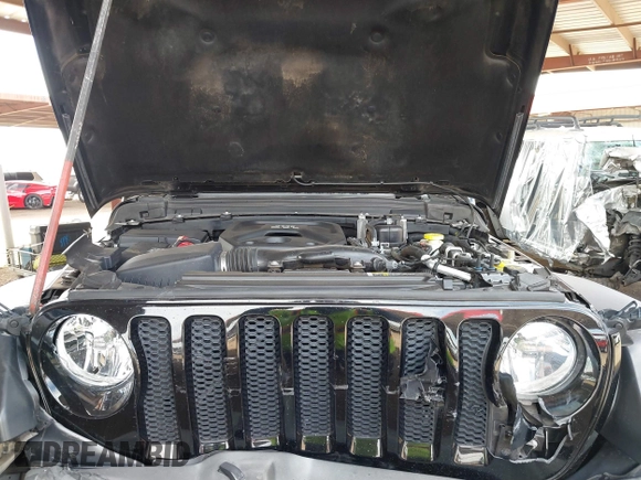 2019 Jeep Wrangler Unlimited Sport S with VIN 1C4HJXDN2KW630780, listed as a IAAI auction lot 41817573 with 56,113 mi miles and . Bid and sale history available at DreamBid. Image 10.