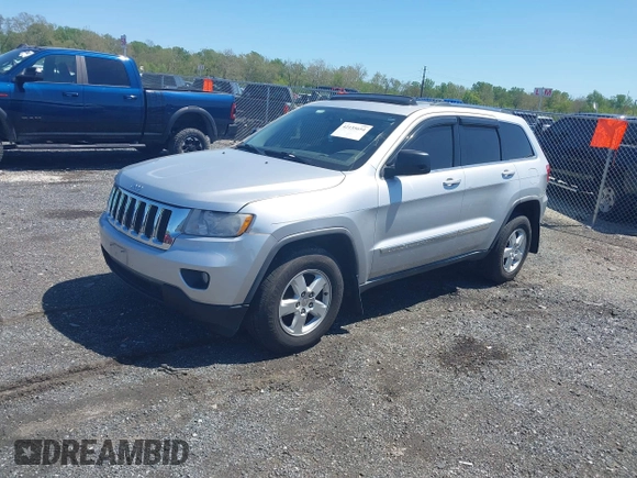 2011 Jeep Grand Cherokee 70th Anniversary with VIN 1J4RR4GG8BC515170, listed as a IAAI auction lot 42135654 with 208,638 mi miles. Bid and sale history available at carsss.com. Image 2.