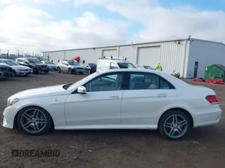 2014 Mercedes-Benz E 550 Sport with VIN WDDHF9BB5EA949457, listed as a IAAI auction lot 41128583 with 99,248 mi miles and . Bid and sale history available at DreamBid. Image 14.