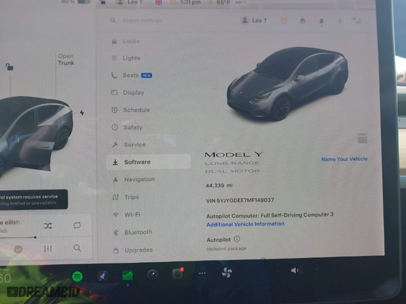 2021 Tesla Model Y Long Range with VIN 5YJYGDEE7MF149037, listed as a IAAI auction lot 41252869 with NaN miles. Bid and sale history available at carsss.com. Image 7.