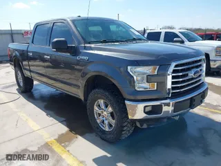2015 Ford F-150 XLT w/HD Payload Pkg with VIN 1FTFW1EF7FKD04869, listed as a IAAI auction lot 41664736 with 165,784 mi miles. Bid and sale history available at carsss.com. Image 1.