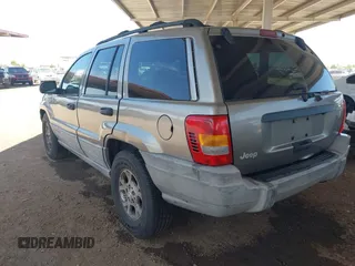 1999 Jeep Grand Cherokee Laredo with VIN 1J4G258S7XC679151, listed as a IAAI auction lot 42500706 with Not provided miles and . Bid and sale history available at DreamBid. Image 3.