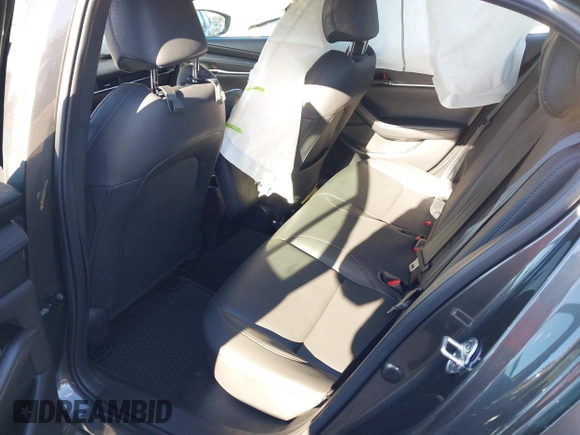 2022 Mazda 3 Carbon Edition z VIN 3MZBPACL4NM309701, wystawiony jako IAAI lot #41419875 z przebiegiem 23 819 mil mil oraz . Historia ofert i sprzedaży dostępna na DreamBid. Obrazek 8.