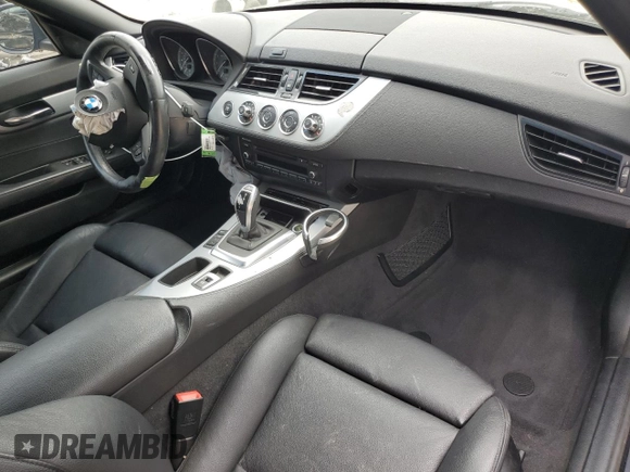 2015 BMW Z4 sDrive35is with VIN WBALM1C59FE634589, listed as a Copart auction lot 67096594 with Not provided miles and Salvage title. Bid and sale history available at DreamBid. Image 8.