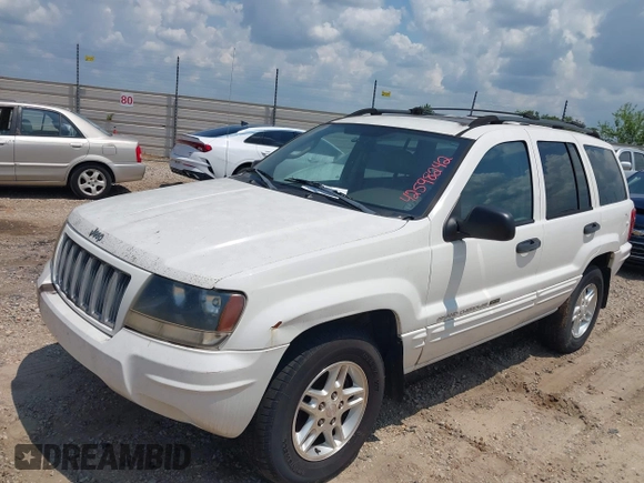 2004 Jeep Grand Cherokee Laredo with VIN 1J4GX48S94C222249, listed as a IAAI auction lot 42598242 with 196,745 mi miles and . Bid and sale history available at DreamBid. Image 2.