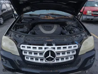 2009 Mercedes-Benz M-Class 3.5L with VIN 4JGBB86E19A526029, listed as a IAAI auction lot 41209546 with 220,885 mi miles. Bid and sale history available at carsss.com. Image 10.