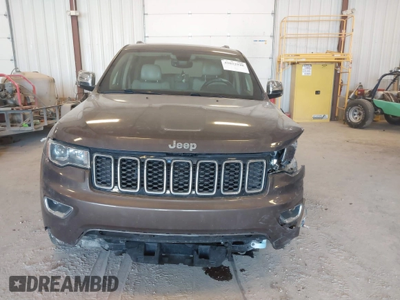 2018 Jeep Grand Cherokee Limited with VIN 1C4RJFBG9JC268479, listed as a IAAI auction lot 42032948 with 106,077 mi miles and . Bid and sale history available at DreamBid. Image 12.