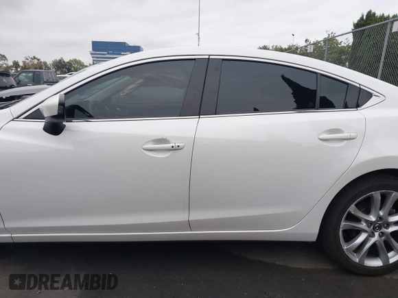2016 Mazda Mazda6 i Touring with VIN JM1GJ1V52G1468807, listed as a IAAI auction lot 41888686 with 121,764 mi miles. Bid and sale history available at carsss.com. Image 14.