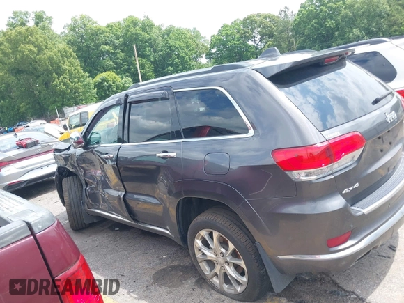 2020 Jeep Grand Cherokee Summit with VIN 1C4RJFJT0LC137054, listed as a IAAI auction lot 42235704 with 70,000 mi miles and . Bid and sale history available at DreamBid. Image 14.