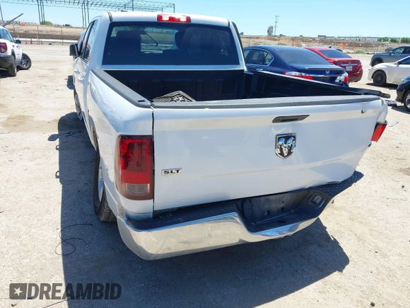 2021 Ram 1500 SLT with VIN 1C6RR6TTXMS517345, listed as a IAAI auction lot 42314123 with 107,307 mi miles and . Bid and sale history available at DreamBid. Image 3.