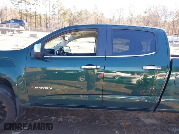 2015 GMC Canyon 4WD SLT with VIN 1GTG6CE35F1273343, listed as a IAAI auction lot 41683758 with 77,911 mi miles. Bid and sale history available at carsss.com. Image 14.