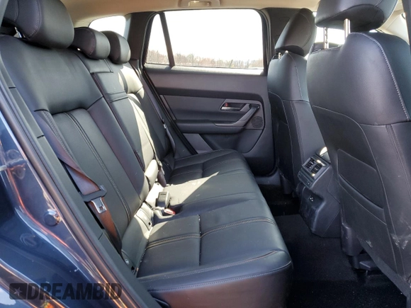2023 Mazda CX-50 Premium Plus with VIN 7MMVABEY1PN125180, listed as a Copart auction lot 52075375 with 32,483 mi miles and Salvage Title. Bid and sale history available at DreamBid. Image 11.