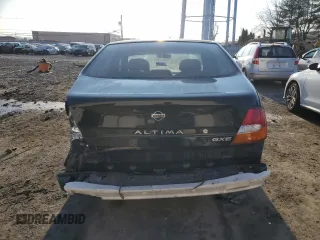 1999 Nissan Altima XE with VIN 1N4DL01D6XC134729, listed as a Copart auction lot 87204104 with 54,155 mi miles and Salvage Title. Bid and sale history available at carsss.com. Image 6.