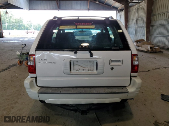 2002 Isuzu Rodeo S with VIN 4S2CK58W724316668, listed as a Copart auction lot 72154754 with 141,590 mi miles and Salvage Title. Bid and sale history available at DreamBid. Image 6.