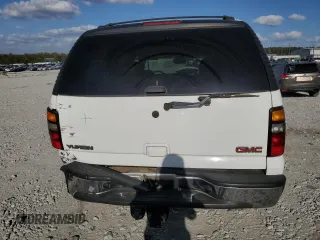 2005 GMC Yukon SLE with VIN 1GKEC13T15J230550, listed as a Copart auction lot 77214624 with 203,095 mi miles and Salvage Title. Bid and sale history available at carsss.com. Image 6.
