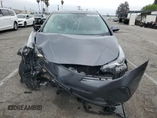 2019 Toyota Prius L Eco z VIN JTDKARFU0K3087436, wystawiony jako Copart lot #55699135 z przebiegiem Nie podano mil oraz Szkoda całkowita • Salvage title. Historia ofert i sprzedaży dostępna na DreamBid. Obrazek 5.