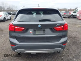 2017 BMW X1 xDrive28i with VIN WBXHT3Z39H4A57753, listed as a IAAI auction lot 41726790 with 52,509 mi miles. Bid and sale history available at carsss.com. Image 16.