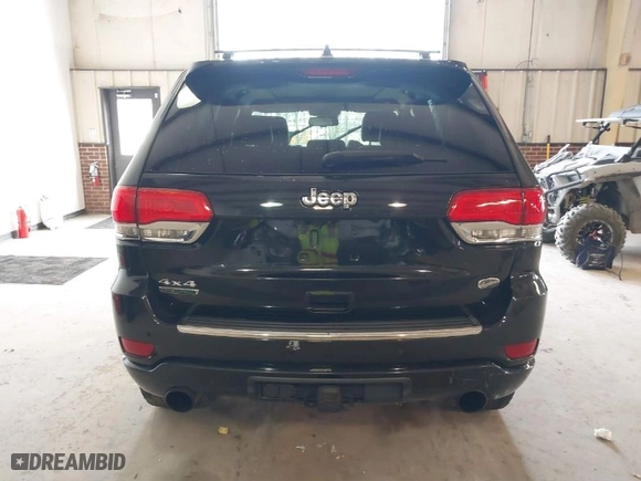 2014 Jeep Grand Cherokee Overland with VIN 1C4RJFCM4EC386398, listed as a IAAI auction lot 41696113 with 119,110 mi miles. Bid and sale history available at carsss.com. Image 16.