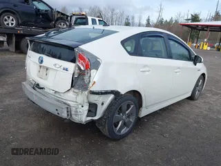 2015 Toyota Prius Four with VIN JTDKN3DU9F0419871, listed as a IAAI auction lot 41598677 with 122,978 mi miles. Bid and sale history available at carsss.com. Image 4.