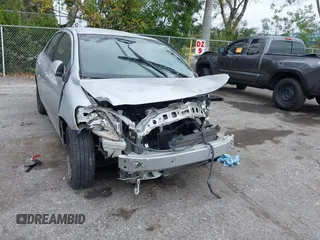 2008 Toyota Yaris with VIN JTDBT923881283264, listed as a IAAI auction lot 41622435 with 174,689 mi miles. Bid and sale history available at carsss.com. Image 6.
