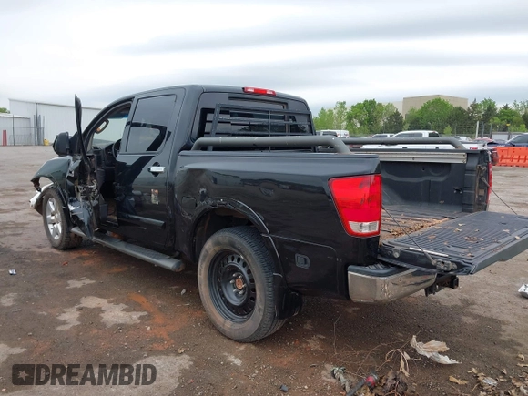 2011 Nissan Titan SL with VIN 1N6BA0ECXBN319286, listed as a IAAI auction lot 42072645 with 304,015 mi miles and . Bid and sale history available at DreamBid. Image 3.