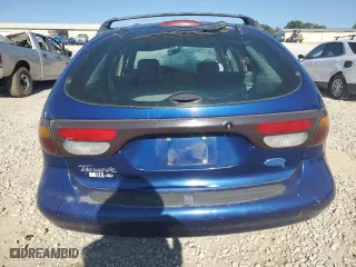 1997 Ford Taurus GL with VIN 1FALP57U2VA153212, listed as a Copart auction lot 75761034 with 167,802 mi miles and Salvage Title. Bid and sale history available at carsss.com. Image 6.