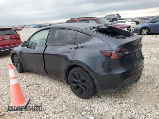 2024 Tesla Model Y with VIN 7SAYGDEDXRA322676, listed as a Copart auction lot 55664125 with 8,788 mi miles and Clean title. Bid and sale history available at DreamBid. Image 2.