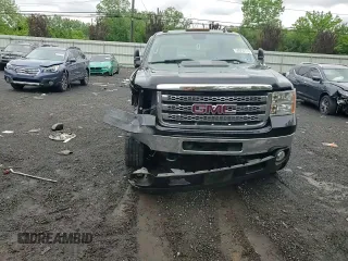 2012 GMC Sierra 2500HD SLE z VIN 1GT220CG3CZ241577, wystawiony jako Copart lot #58050175 z przebiegiem 166 821 mil mil oraz Szkoda całkowita • Salvage title. Historia ofert i sprzedaży dostępna na DreamBid. Obrazek 13.