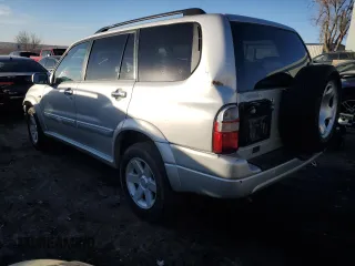 2003 Suzuki XL7 Touring with VIN JS3TX92V834105180, listed as a Copart auction lot 88967215 with 156,335 mi miles and Clean title. Bid and sale history available at DreamBid. Image 2.