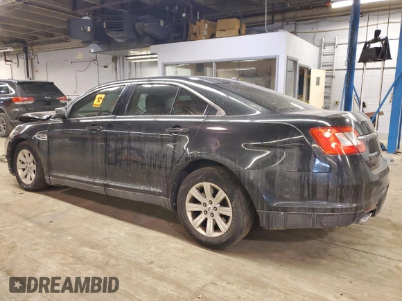 2011 Ford Taurus SE with VIN 1FAHP2DW3BG163699, listed as a Copart auction lot 43186495 with 84,493 mi miles and Salvage Title. Bid and sale history available at DreamBid. Image 2.