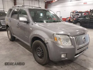 2008 Mercury Mariner Premier z VIN 4M2CU87108KJ15433, wystawiony jako IAAI lot #41924055 z przebiegiem 168 569 mil mil oraz . Historia ofert i sprzedaży dostępna na DreamBid. Obrazek 1.