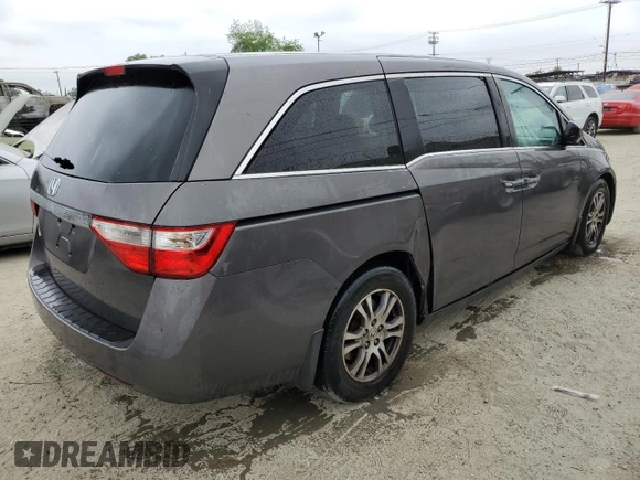 2013 Honda Odyssey EX z VIN 5FNRL5H40DB070687, wystawiony jako Copart lot #58624925 z przebiegiem 232 232 mil mil oraz Czysty tytuł • Clean title. Historia ofert i sprzedaży dostępna na DreamBid. Obrazek 3.