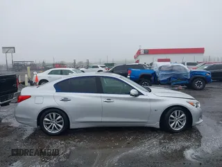 2014 Infiniti Q50 Premium with VIN JN1BV7AP3EM674645, listed as a IAAI auction lot 41941054 with 77,270 mi miles. Bid and sale history available at carsss.com. Image 13.