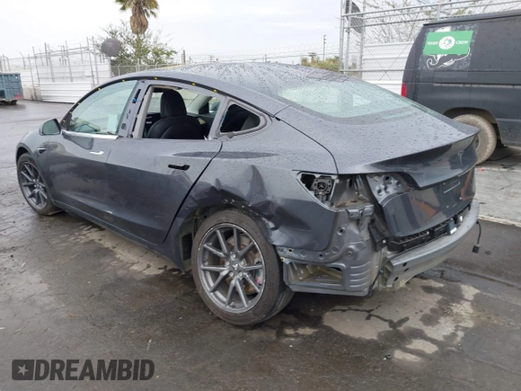 2018 Tesla Model 3 Long Range Battery with VIN 5YJ3E1EB7JF114305, listed as a IAAI auction lot 41765994 with 76,945 mi miles and . Bid and sale history available at DreamBid. Image 3.