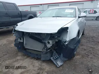 2012 Cadillac CTS z VIN 1G6DC5E52C0123719, wystawiony jako IAAI lot #41997649 z przebiegiem 79 705 mil mil oraz . Historia ofert i sprzedaży dostępna na DreamBid. Obrazek 6.