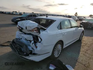 2016 Volkswagen Passat SE с VIN 1VWBT7A37GC020690, выставлен на аукционе Copart как лот 65091314 с пробегом 89 027 миль миль и Списание • Salvage title. История ставок и продаж доступна на DreamBid. Изображение 3.