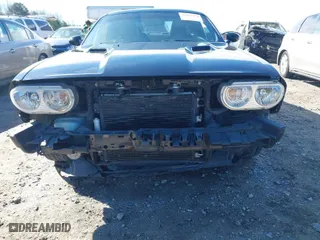 2012 Dodge Challenger SXT Plus with VIN 2C3CDYAG3CH196337, listed as a IAAI auction lot 41661921 with 162,490 mi miles. Bid and sale history available at carsss.com. Image 6.