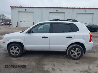 2006 Hyundai Tucson GL with VIN KM8JM12BX6U467288, listed as a IAAI auction lot 41679827 with 146,973 mi miles. Bid and sale history available at carsss.com. Image 15.