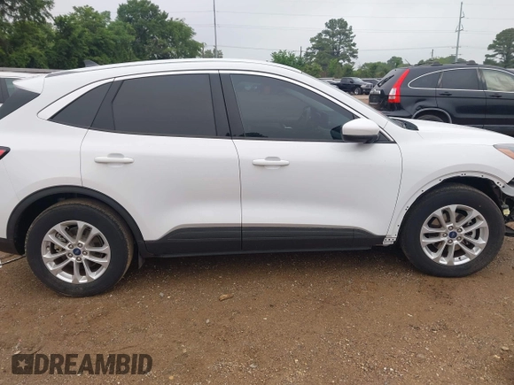 2021 Ford Escape SE with VIN 1FMCU0G67MUA28772, listed as a IAAI auction lot 42114499 with 21,818 mi miles and . Bid and sale history available at DreamBid. Image 14.