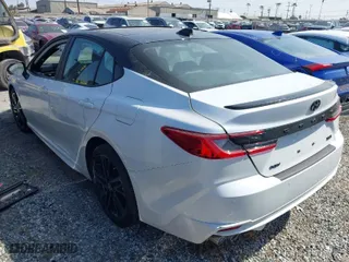 2025 Toyota Camry LE with VIN 4T1DAACK0SU056092, listed as a IAAI auction lot 41906530 with 3,534 mi miles. Bid and sale history available at carsss.com. Image 3.