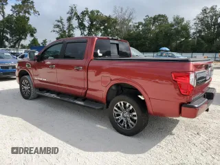 2016 Nissan Titan XD Platinum Reserve with VIN 1N6BA1F26GN504857, listed as a Copart auction lot 78143964 with 114,257 mi miles and Salvage Title. Bid and sale history available at carsss.com. Image 2.