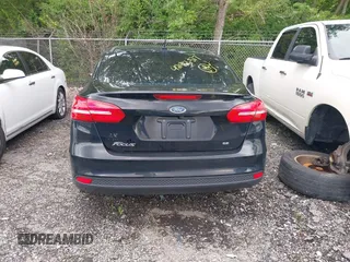 2018 Ford Focus SE with VIN 1FADP3F24JL248653, listed as a IAAI auction lot 42416377 with 113,856 mi miles and . Bid and sale history available at DreamBid. Image 16.