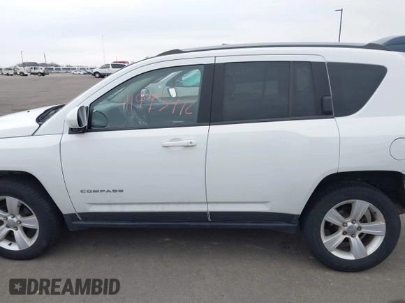 2015 Jeep Compass High Altitude Edition with VIN 1C4NJDEB6FD357687, listed as a IAAI auction lot 41995472 with 91,780 mi miles. Bid and sale history available at carsss.com. Image 14.