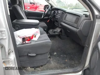 2002 Dodge 1500 z VIN 3D7HU18Z72G142477, wystawiony jako IAAI lot #42020799 z przebiegiem 208 996 mil mil oraz . Historia ofert i sprzedaży dostępna na DreamBid. Obrazek 5.