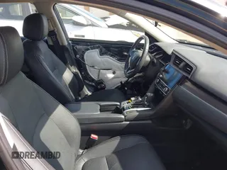 2019 Honda Civic EX z VIN 19XFC1F30KE018579, wystawiony jako IAAI lot #42167475 z przebiegiem 79 228 mil mil oraz . Historia ofert i sprzedaży dostępna na DreamBid. Obrazek 5.