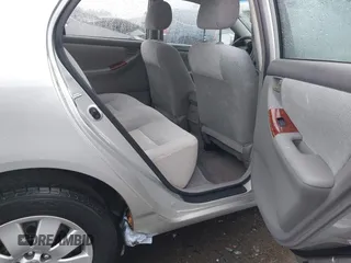 2004 Toyota Corolla CE with VIN JTDBR38E642035944, listed as a IAAI auction lot 42173263 with 119,302 mi miles. Bid and sale history available at carsss.com. Image 8.